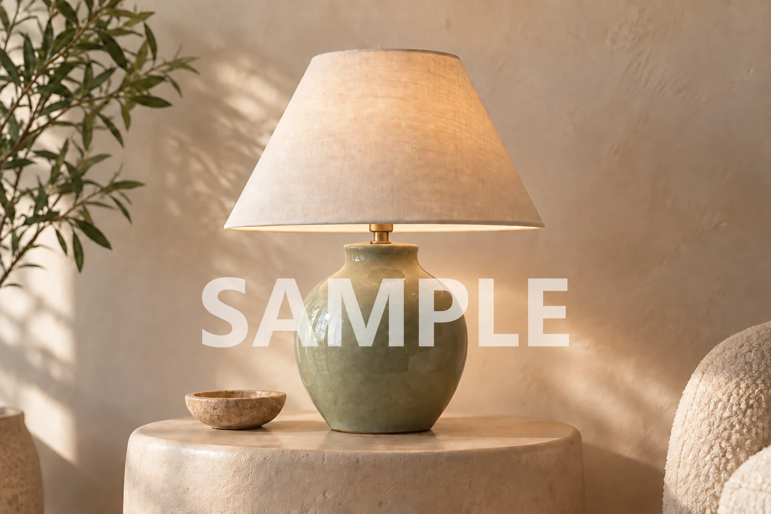 Before: a translucent SAMPLE text watermark spans the ceramic table lamp and background